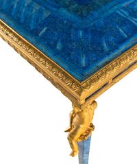 An Empire Style Gilt Bronze Mounted Lapis Lazuli Center Table