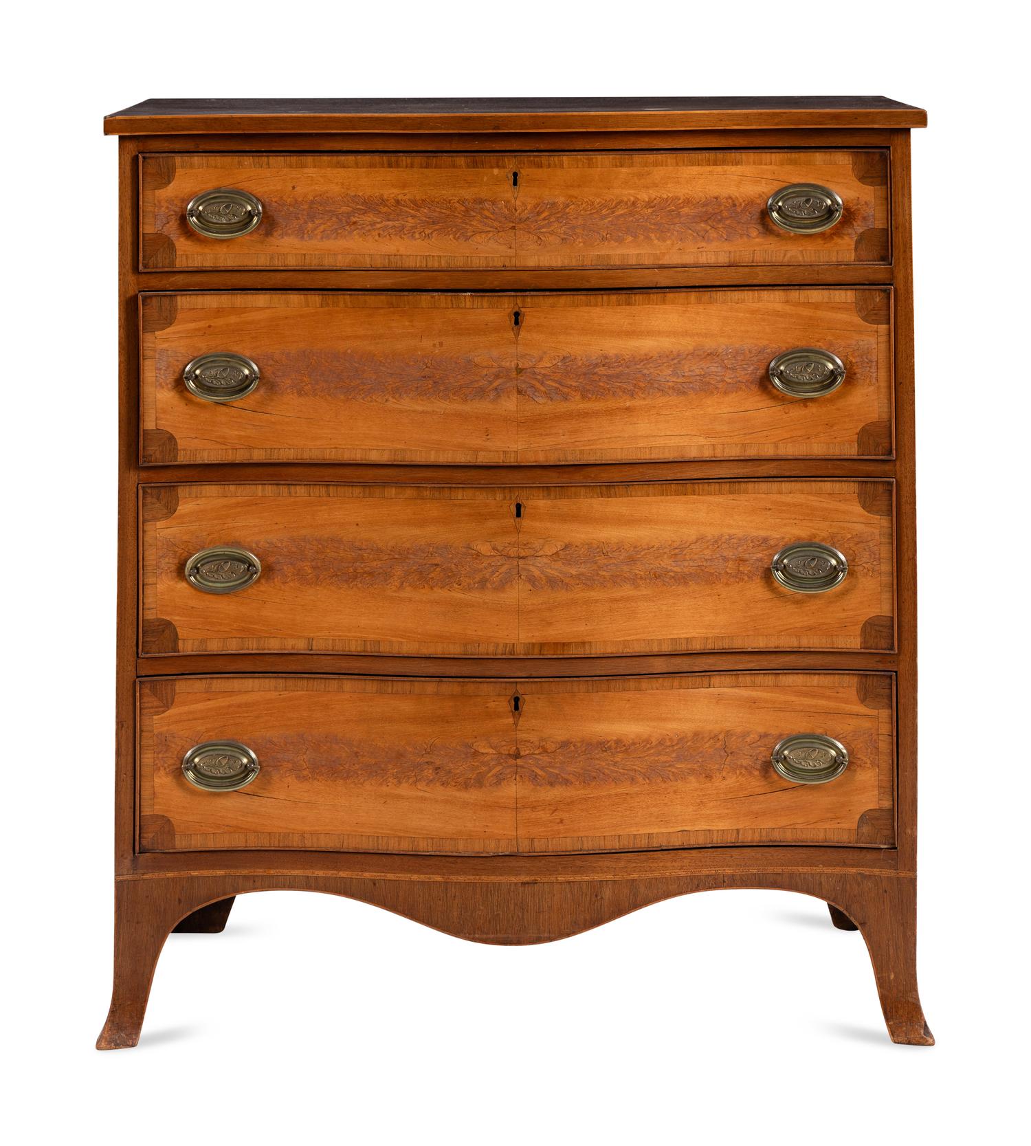 A Federal Mahogany and Inlaid Serpentine-Front Chest of Drawers