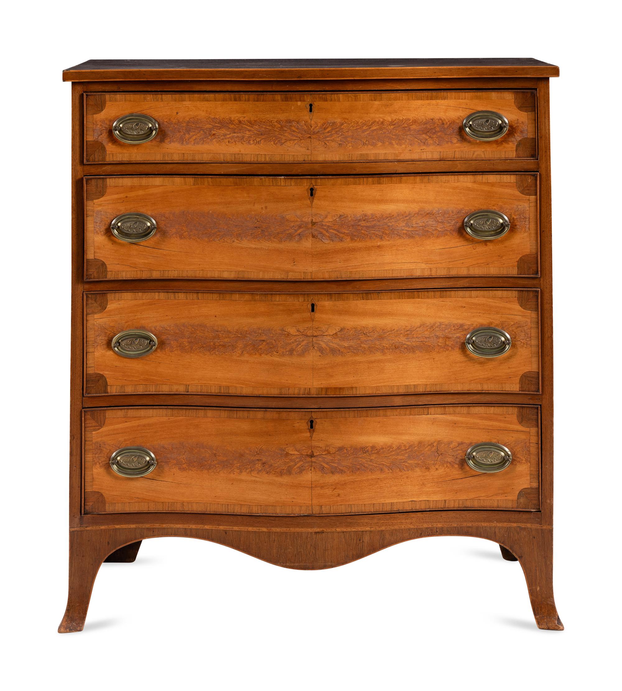 A Federal Mahogany and Inlaid Serpentine-Front Chest of Drawers