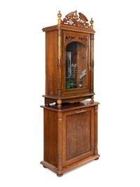 A 24-Inch Lochmann's Original Disc Music Box with Tubular Bells and Base Cabinet