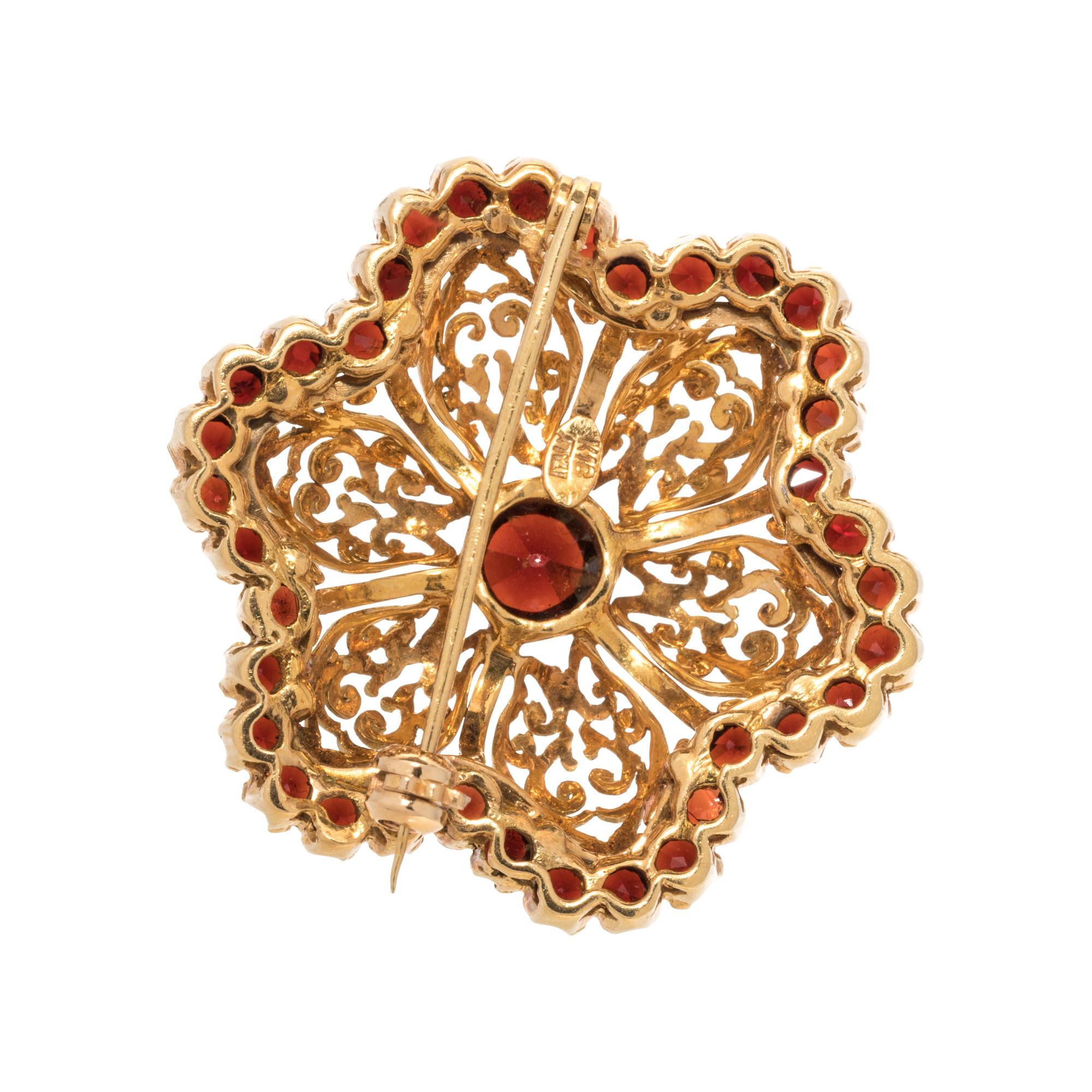 YELLOW GOLD AND GARNET BROOCH