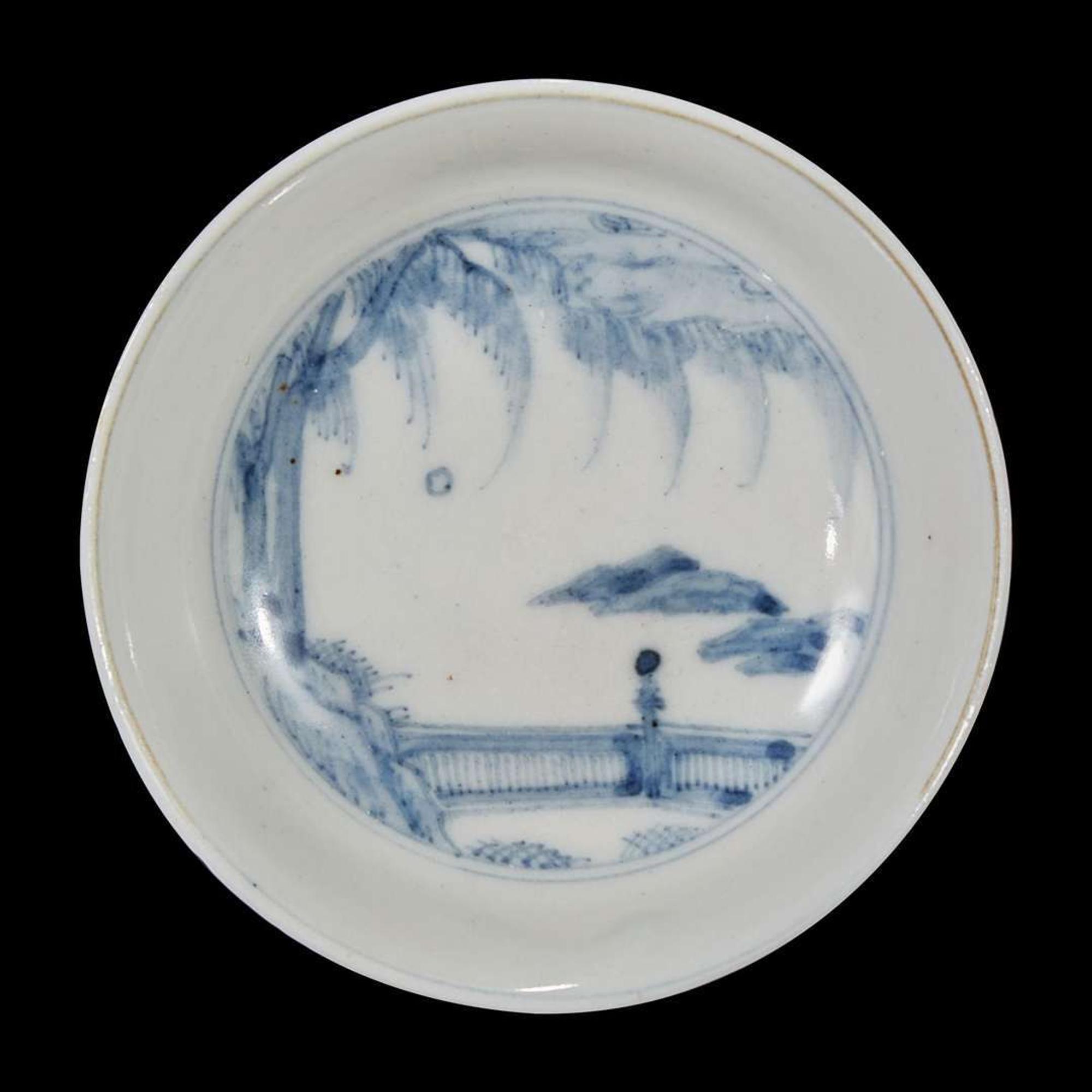 Seven assorted glass, porcelain snuff bottles; a vase; and a small blue and white porcelain tazza