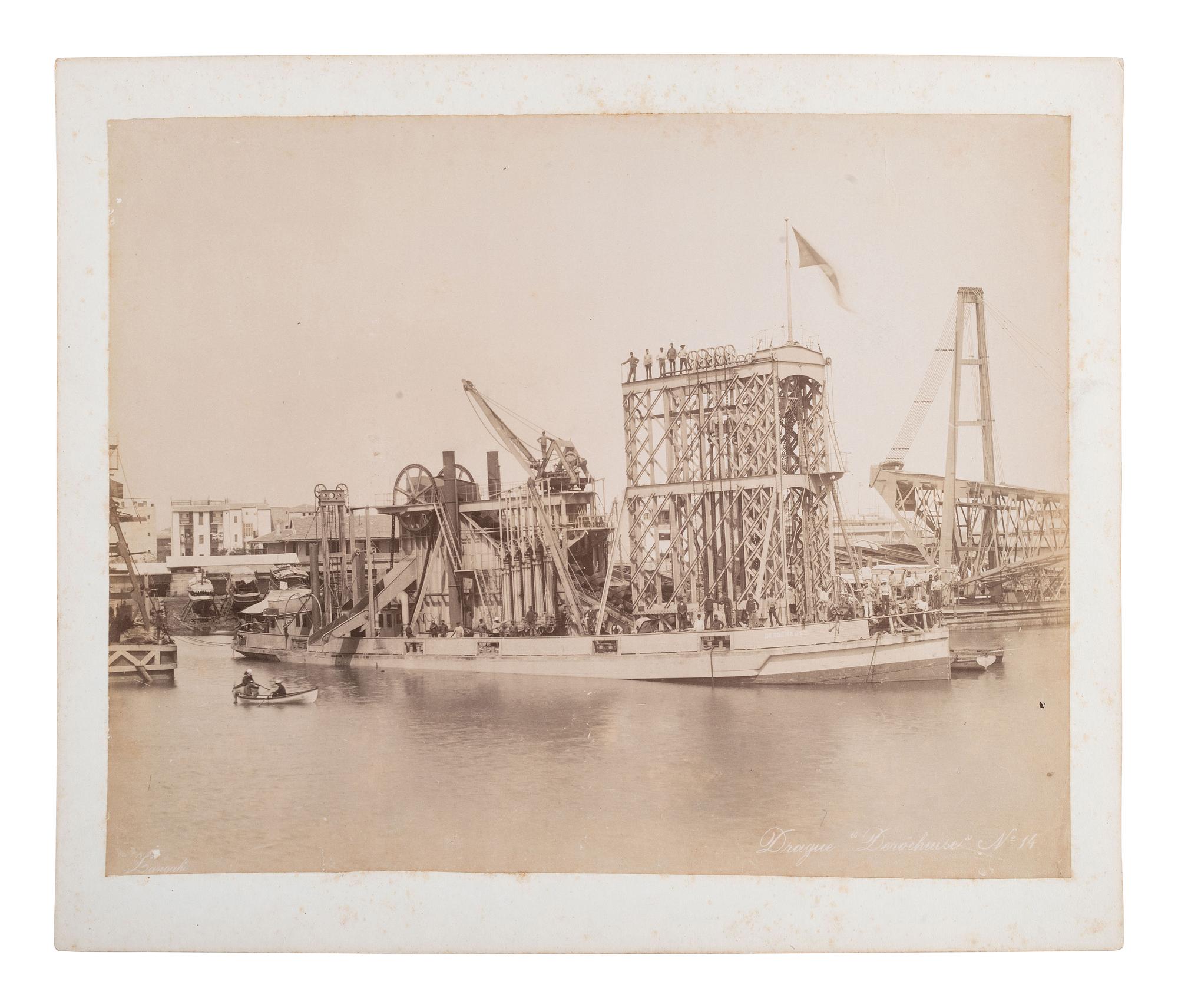 [EARLY PHOTOGRAPHY]. ZANGAKI, photog. Photograph of large steam dredge, Derocheuse. Ca 1880s-90s.