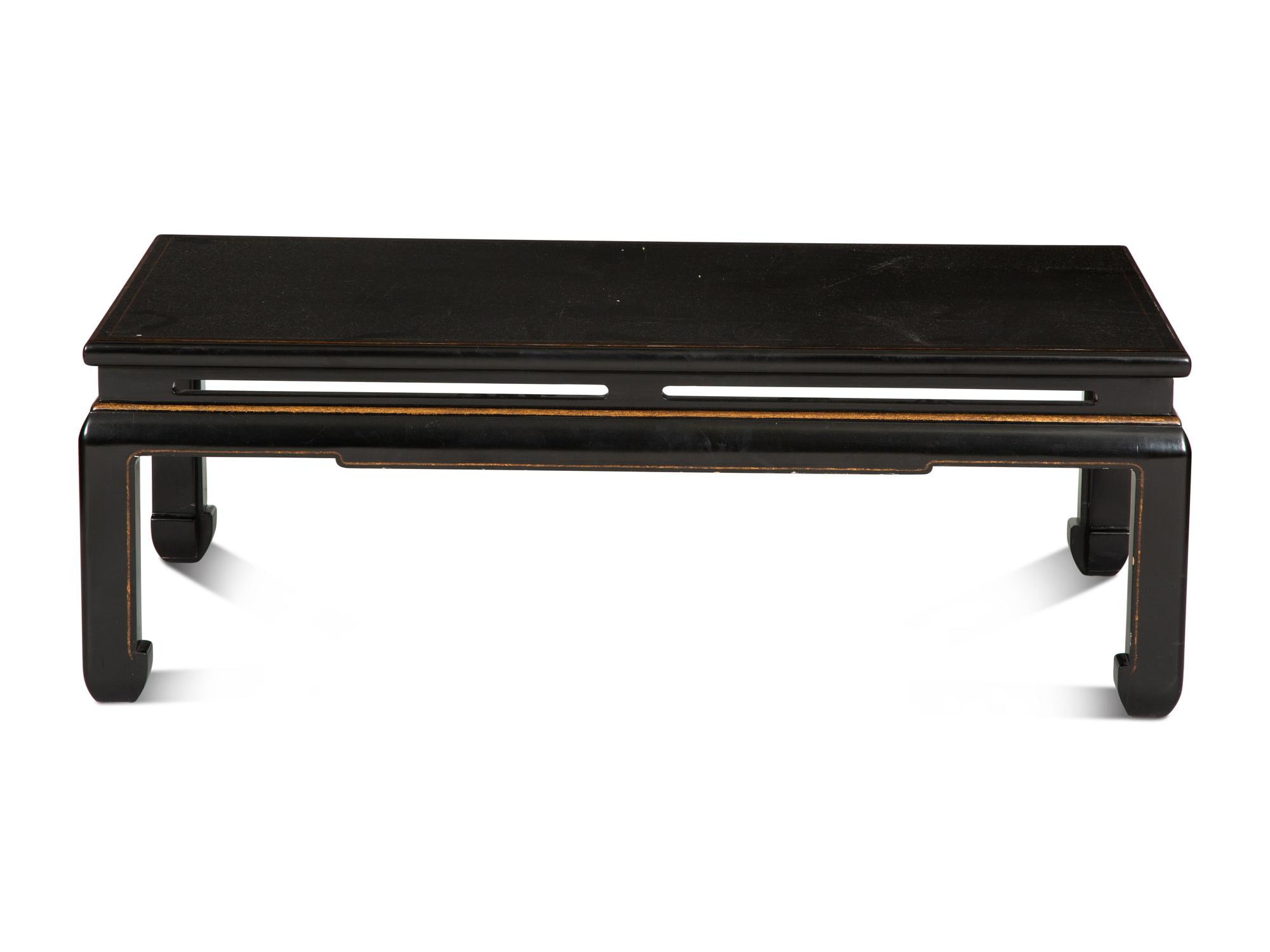 A Chinese Export Ming Style Black and Parcel Gilt Lacquer Low Table