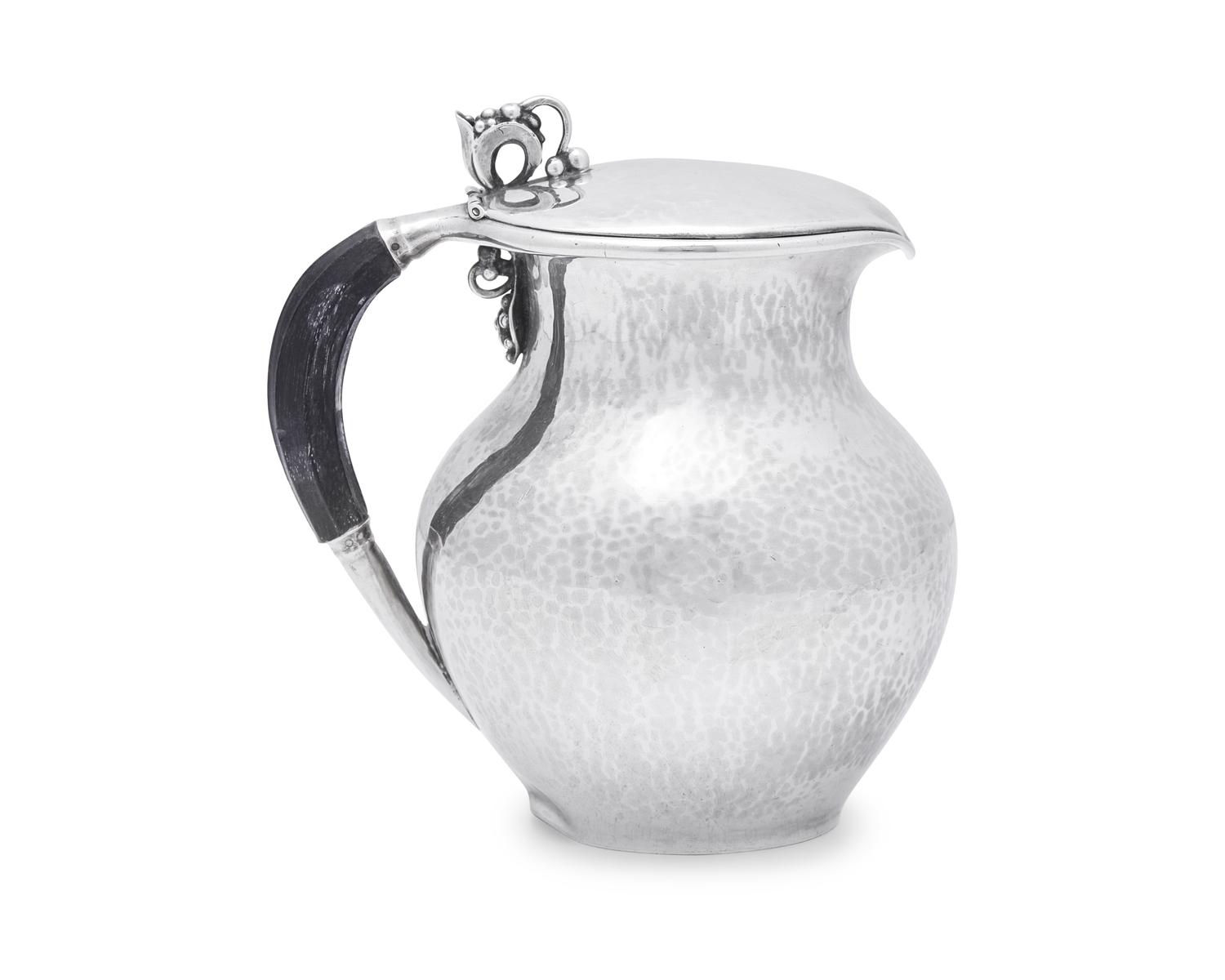 A Georg Jensen Silver Syrup Jug