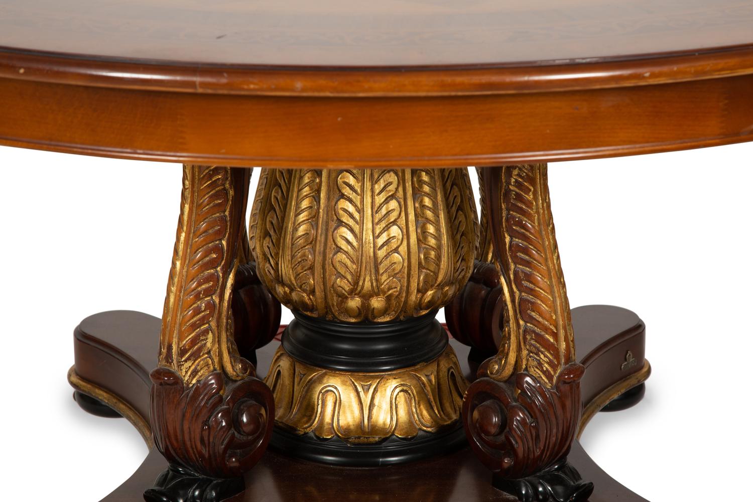 An Empire Style Inlaid Beechwood and Parcel Gilt Center Table by Hurtado