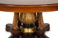 An Empire Style Inlaid Beechwood and Parcel Gilt Center Table by Hurtado