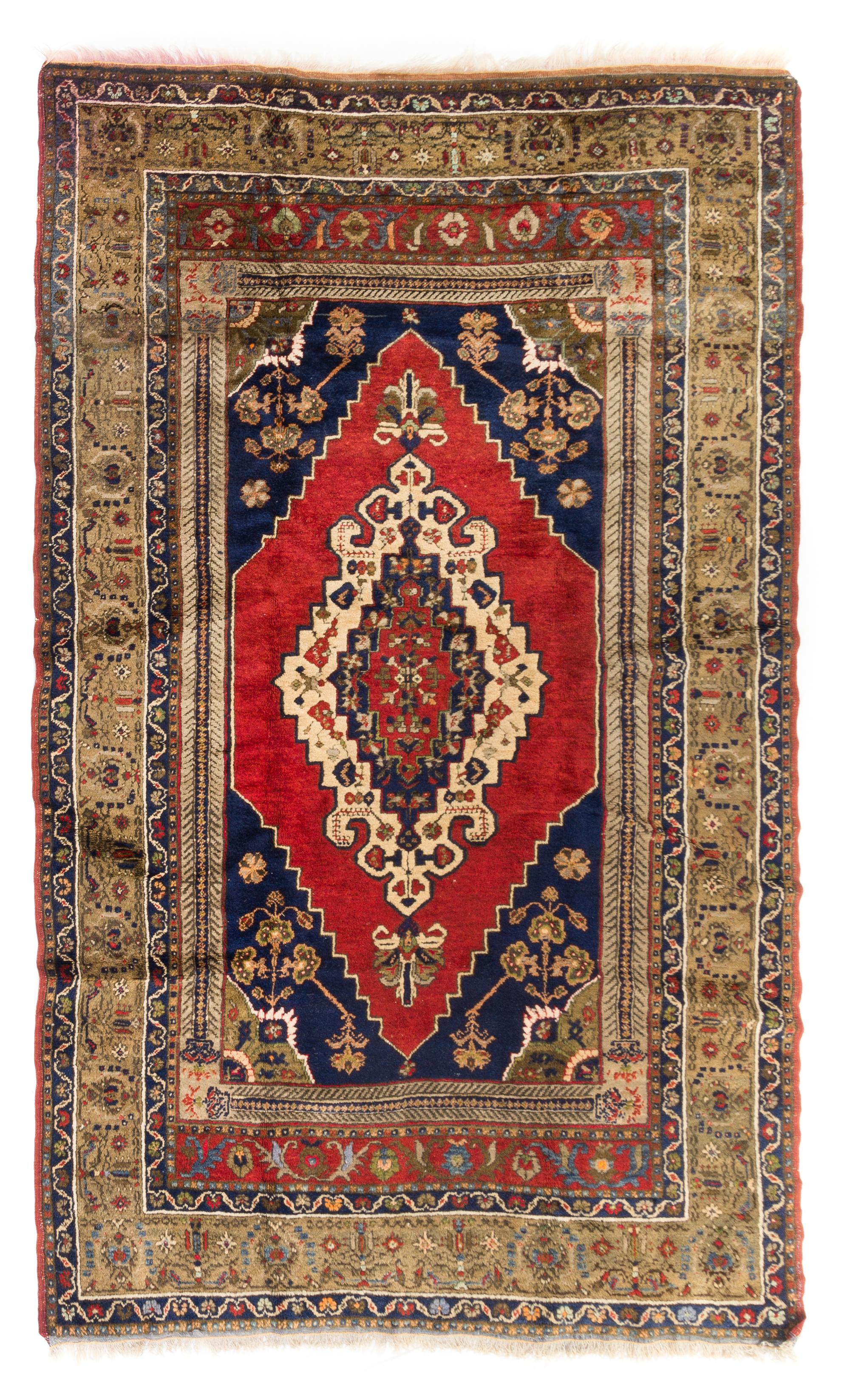 A Tabriz Wool Rug 7 feet 2 inches x 4 feet 2 inches.