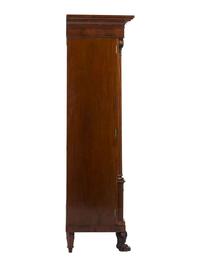 A Classical Carved and Highly Figured Mahogany Wardrobe