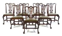 A Set of Seven Irish Chippendale Style Mahogany Side Chairs, Height 38 inches.