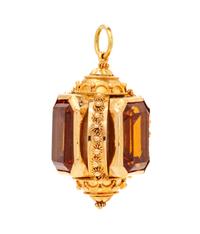 A Rose Gold and Synthetic Orange Sapphire Charm,