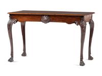 An Irish George III Shell, Acanthus and Bell-Flower Carved and Figured Mahogany Hairy Paw Foot Side Table