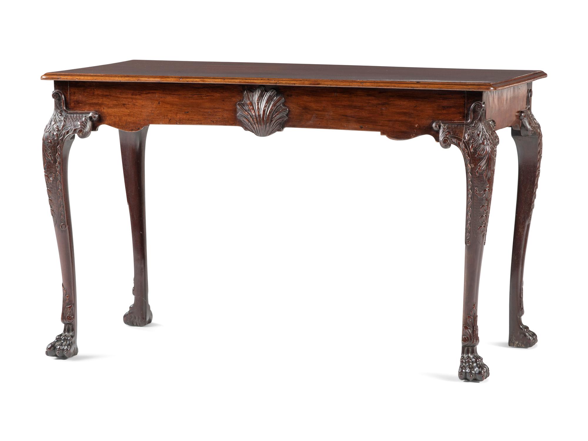An Irish George III Shell, Acanthus and Bell-Flower Carved and Figured Mahogany Hairy Paw Foot Side Table
