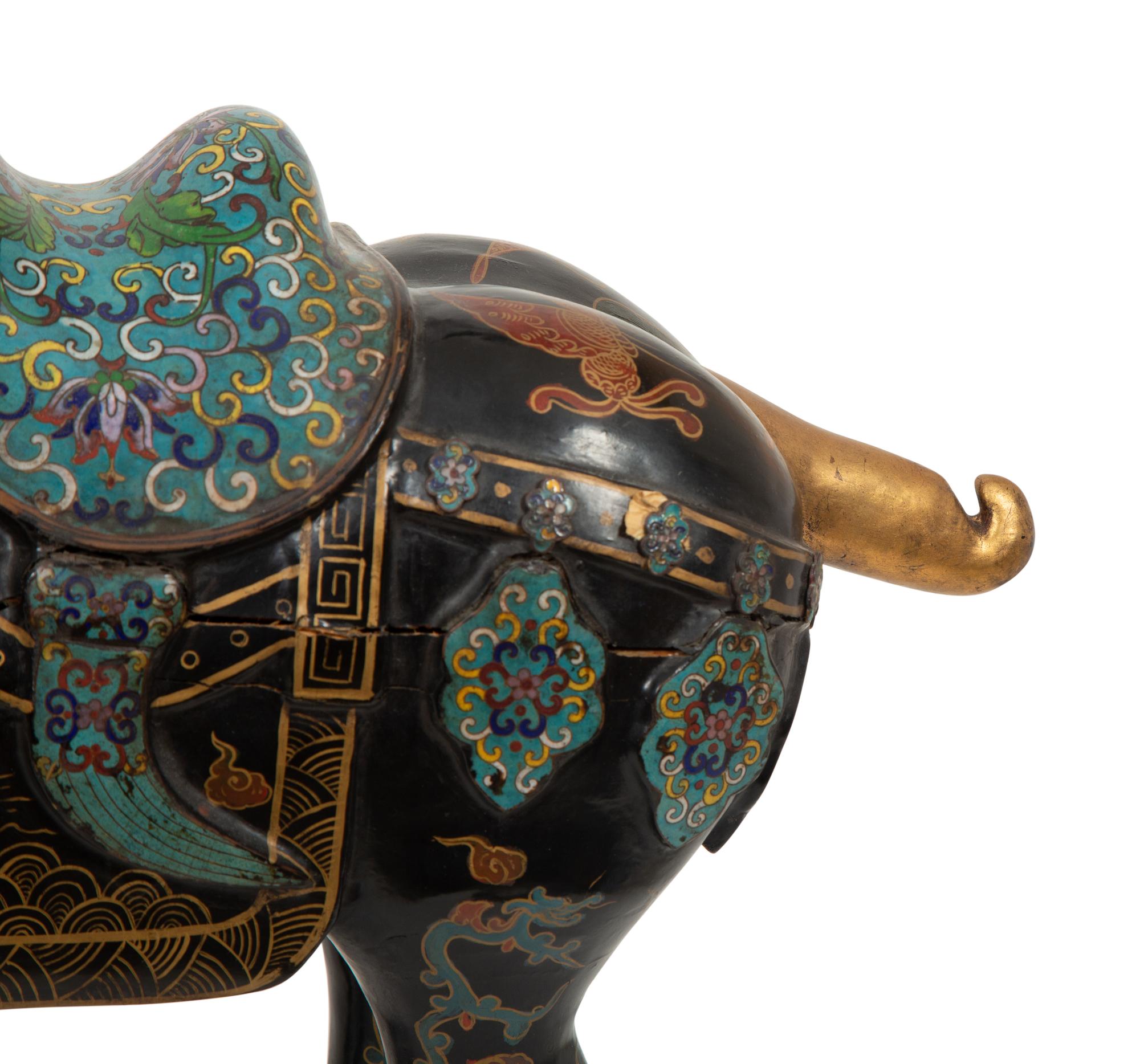 A Pair of Chinese Painted Wood and Cloisonné Models of Horses