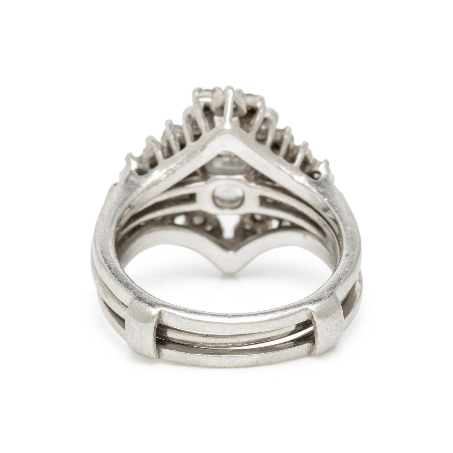 DIAMOND AND PLATINUM RING WITH JACKET