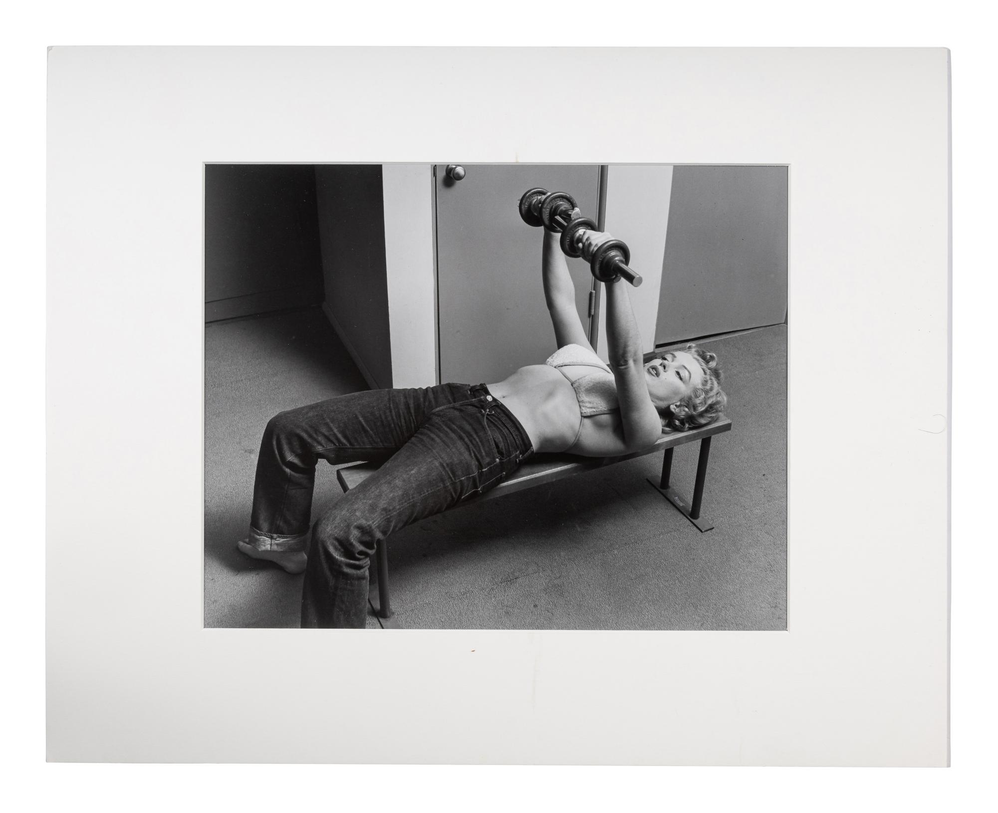Philippe Halsman (1906-1979) Marilyn Monroe Lifting Weights, 1952