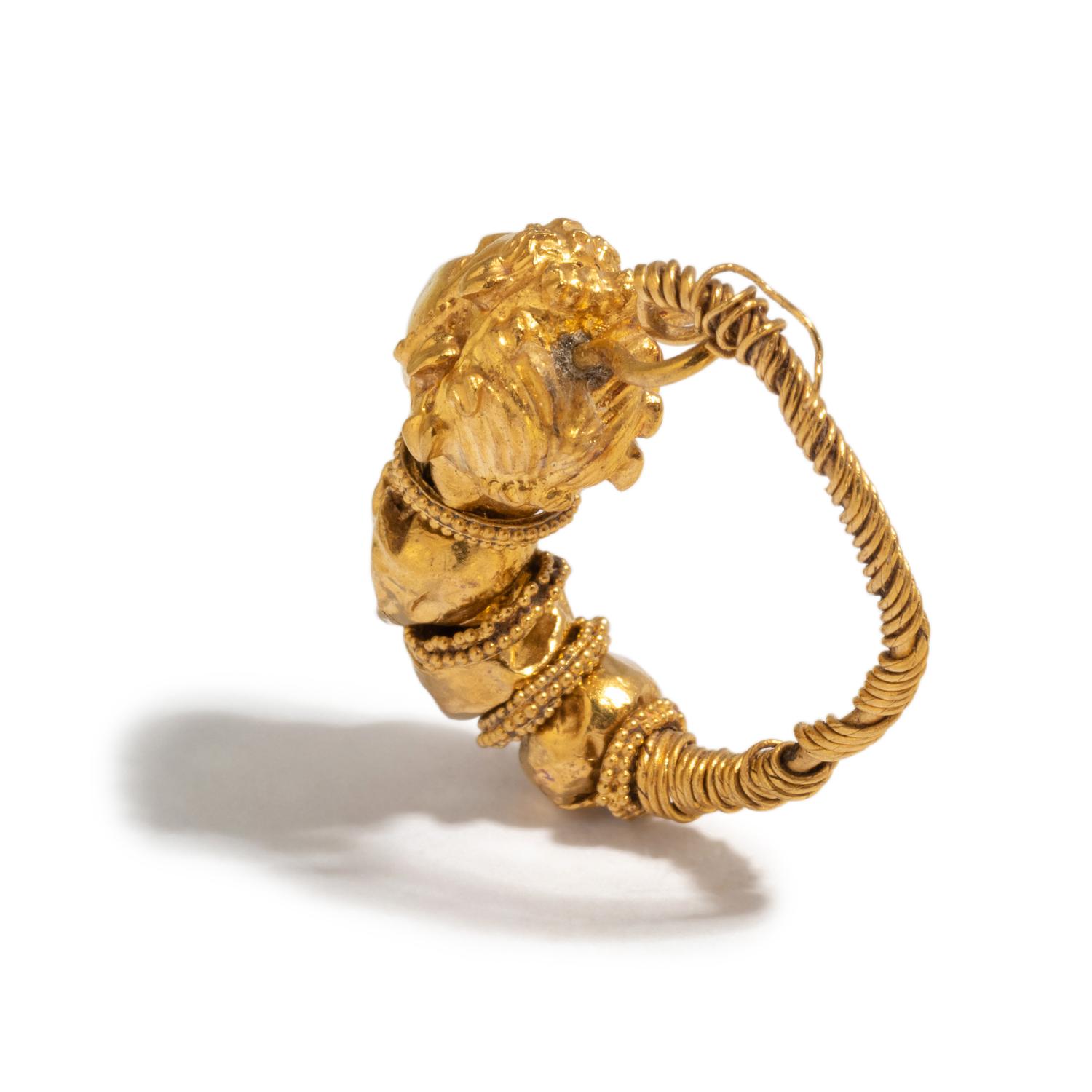 A Greek Gold Earring with the Head of a Maenad