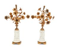 A Pair of Gilt Metal Mounted Bisque Porcelain Figural Ornaments