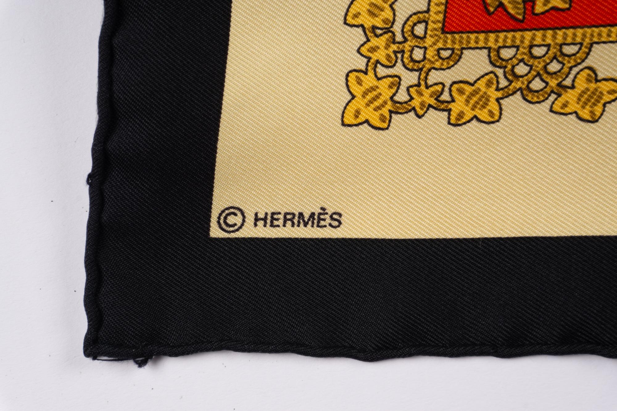 A Group of Three Hermès Silk Scarves