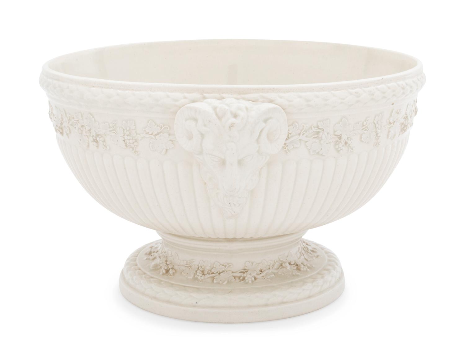 A Wedgwood Bisque Pottery Three-Piece Garniture