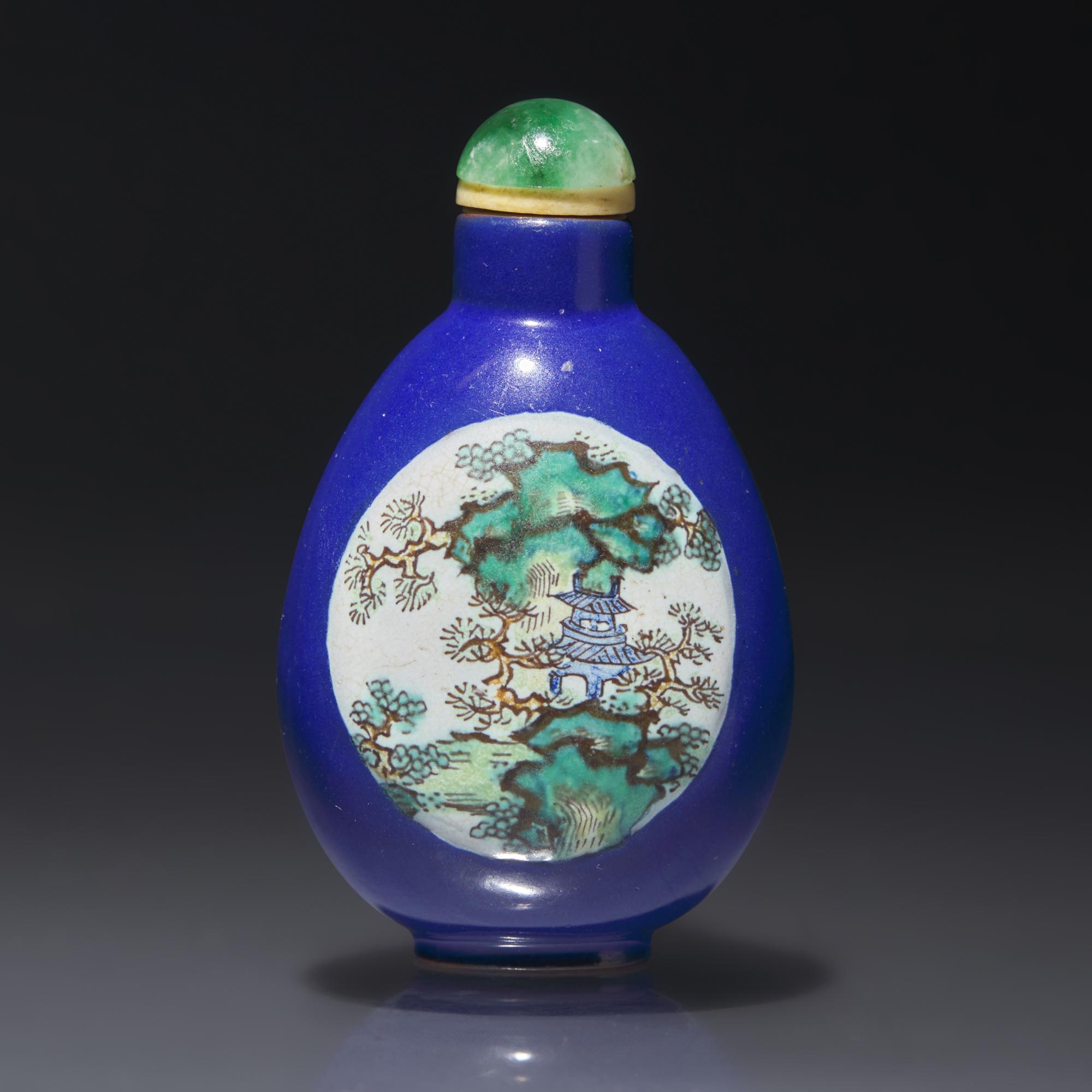 A Chinese Enameled Yixing Stoneware Snuff Bottle, Qing Dynasty, Circa 1821-1850 — 1821-1850年 宜興紫砂藍地開光山水圖鼻煙壺