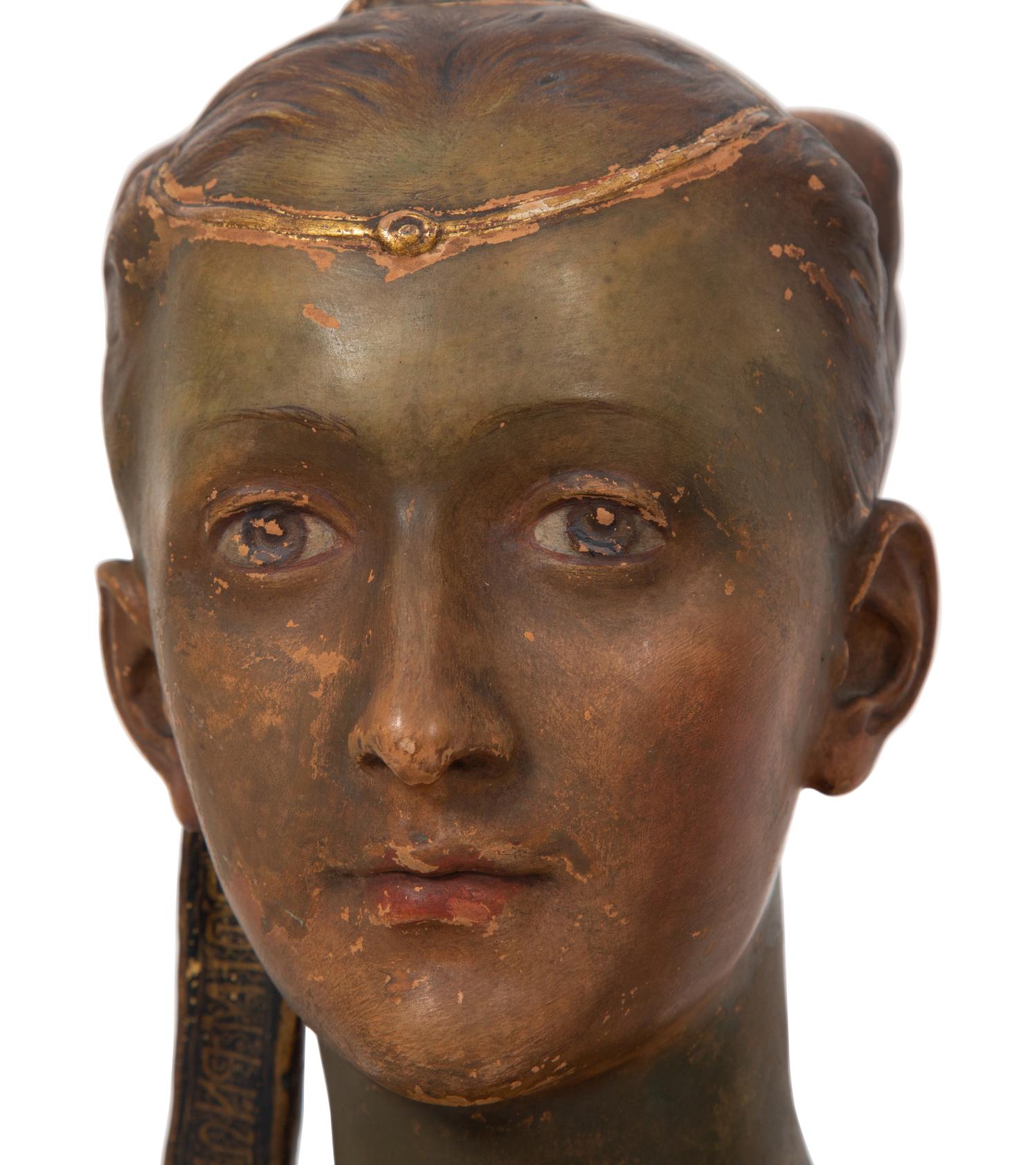 Three Italian Painted and Parcel Gilt Terracotta Busts of Renaissance Women