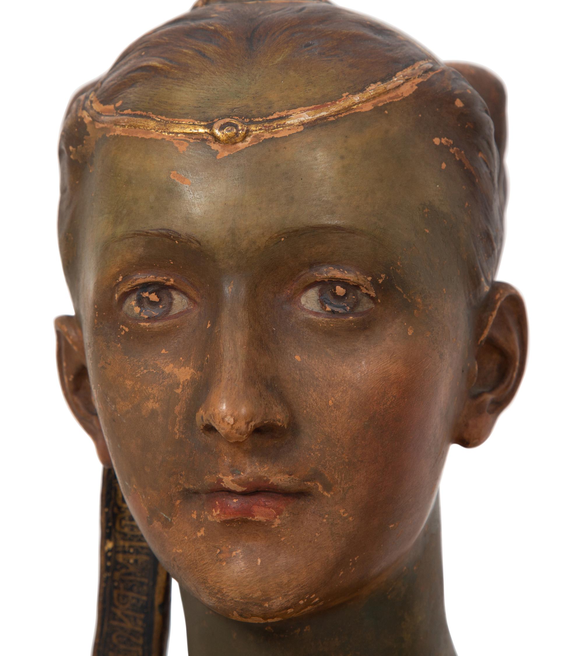 Three Italian Painted and Parcel Gilt Terracotta Busts of Renaissance Women