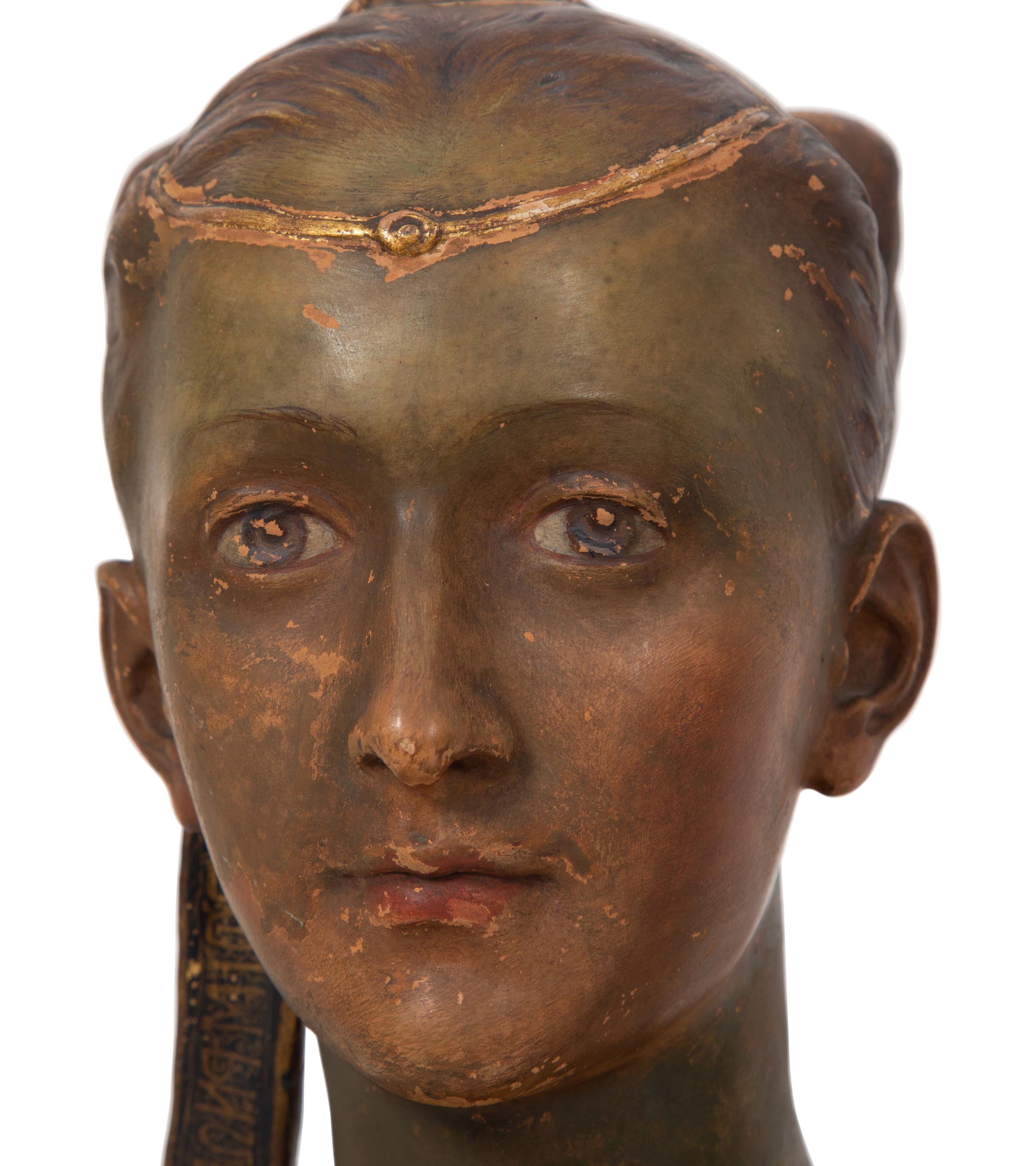 Three Italian Painted and Parcel Gilt Terracotta Busts of Renaissance Women