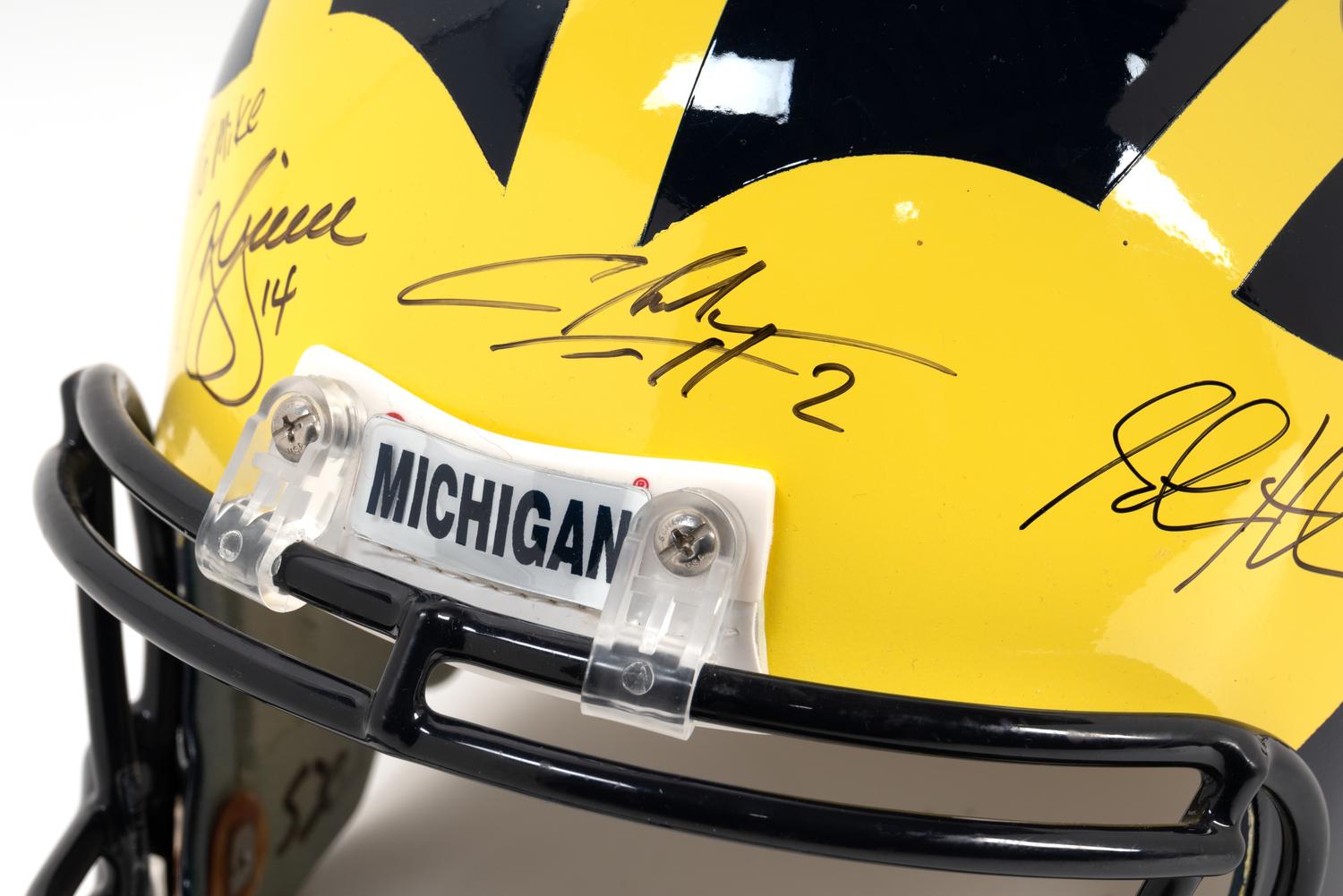 A Multi Signed 1997 University of Michigan Signed Autograph Riddell Full Size Football Helmet Including Charles Woodson and Lloyd Carr (BAS Beckett Authentication Services Certified),
