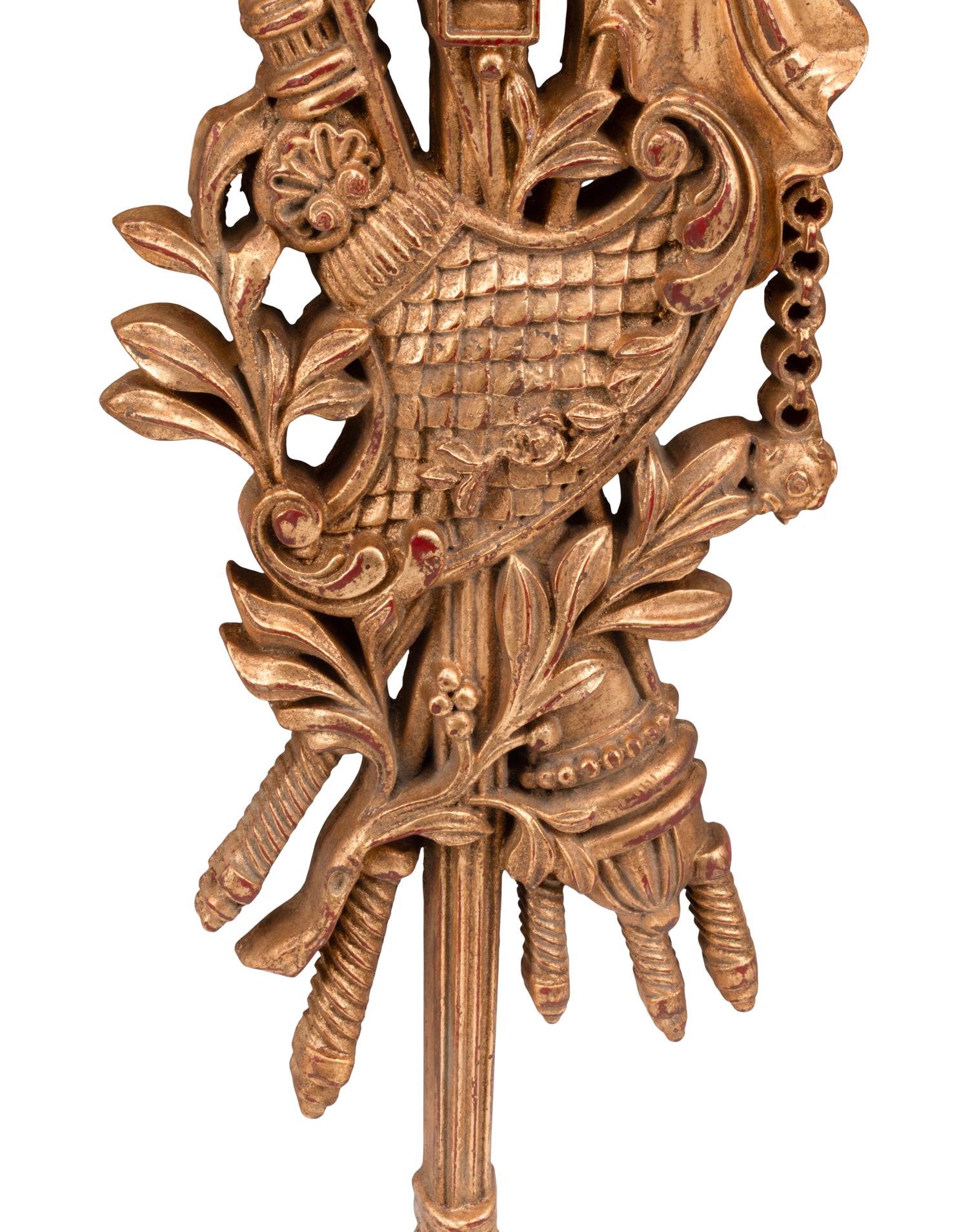 A Set of Four French Carved Giltwood Plaques
