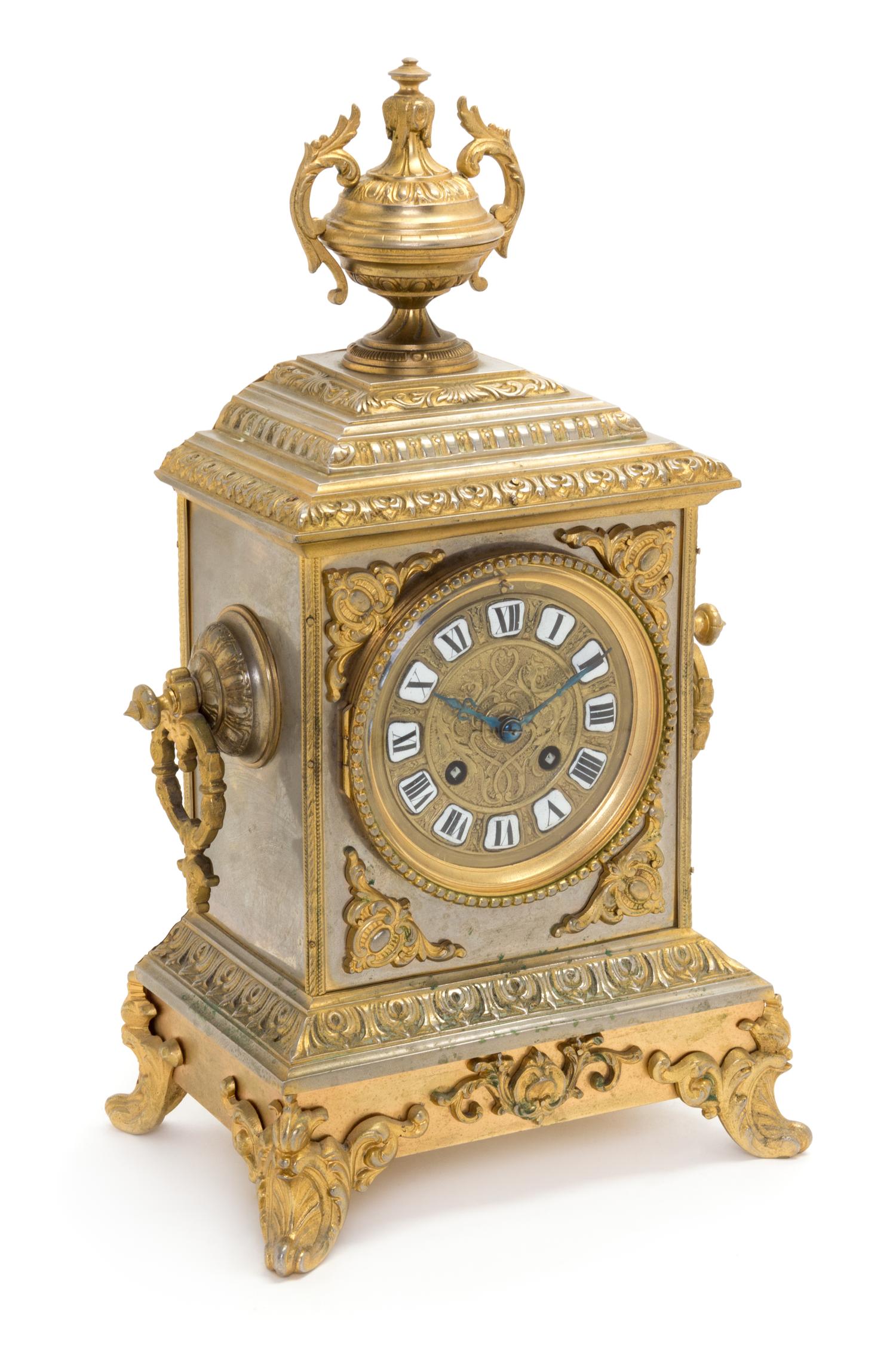 A French Brass Mantel Clock Height 16 inches. — LATE 19TH CENTURY