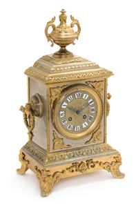 A French Brass Mantel Clock Height 16 inches. — LATE 19TH CENTURY