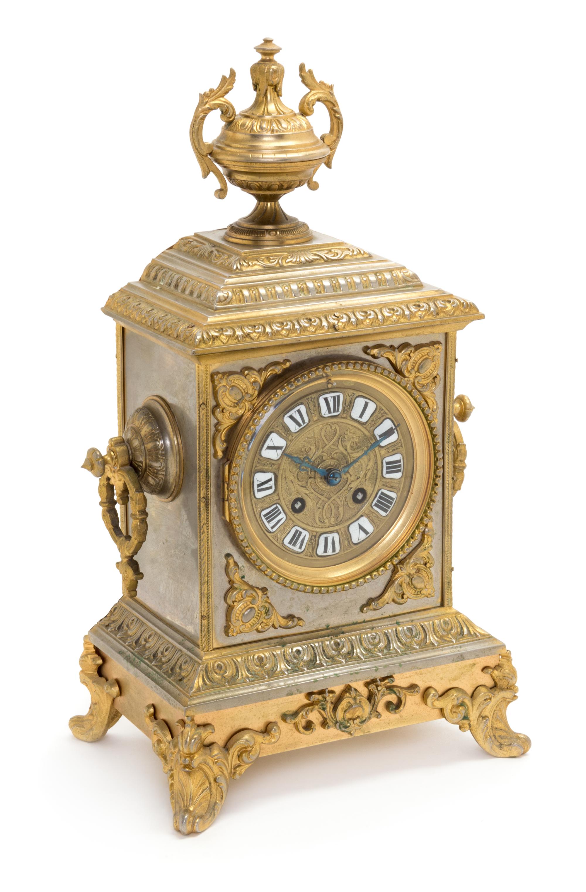 A French Brass Mantel Clock Height 16 inches. — LATE 19TH CENTURY
