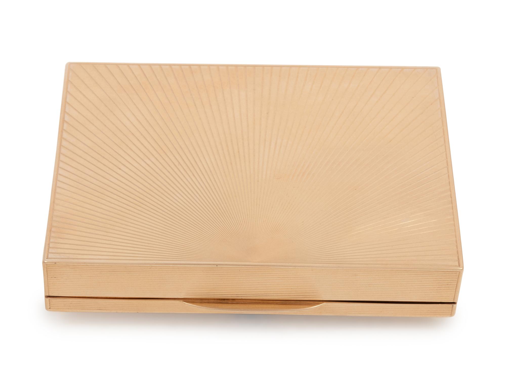 A Tiffany & Co. Gold, Diamond and Ruby Mounted Cigarette Case