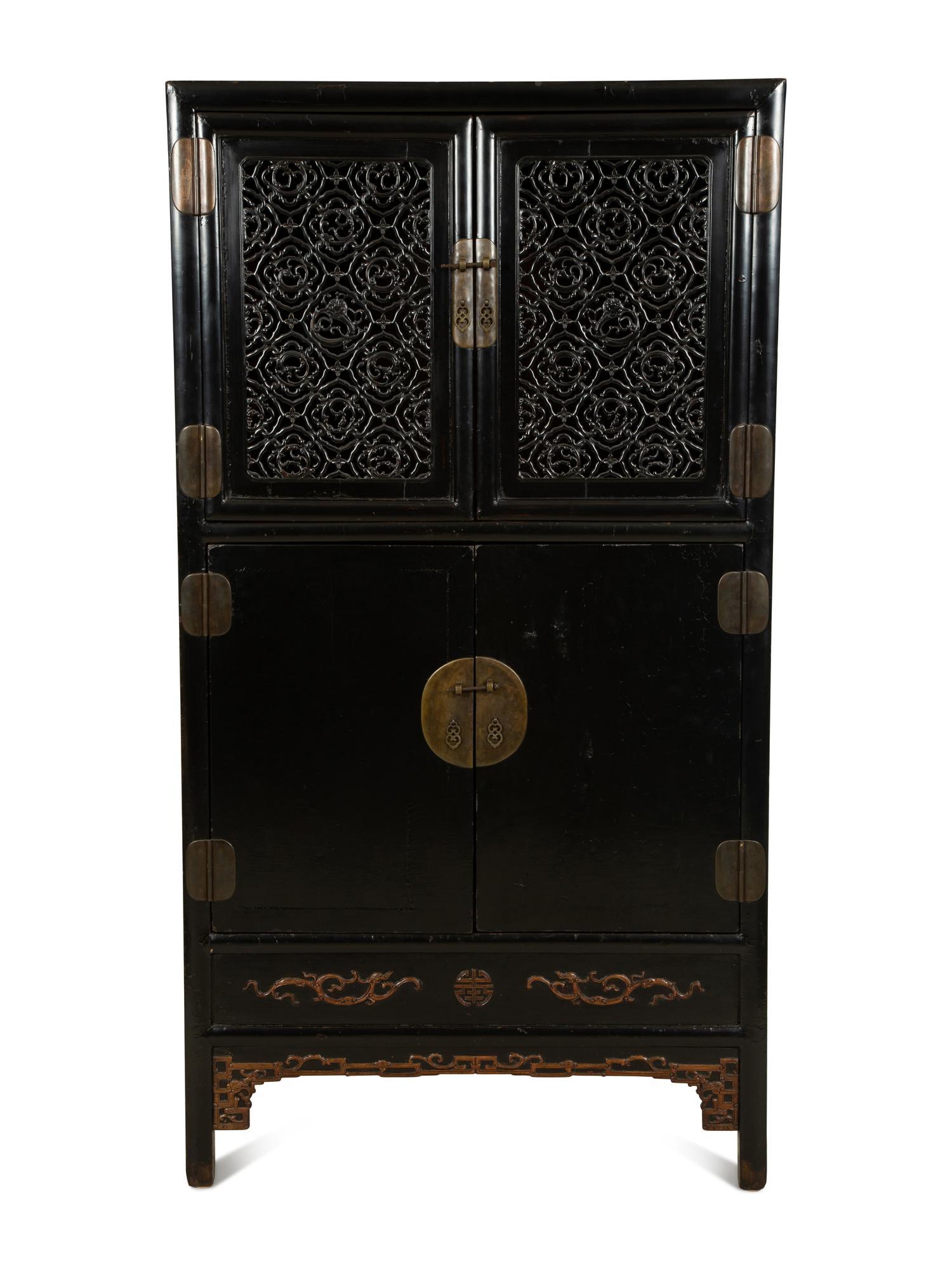 A Chinese Black Lacquer Cabinet with Pierce-carved Upper Door Panels