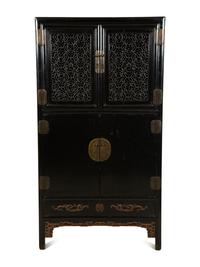 A Chinese Black Lacquer Cabinet with Pierce-carved Upper Door Panels