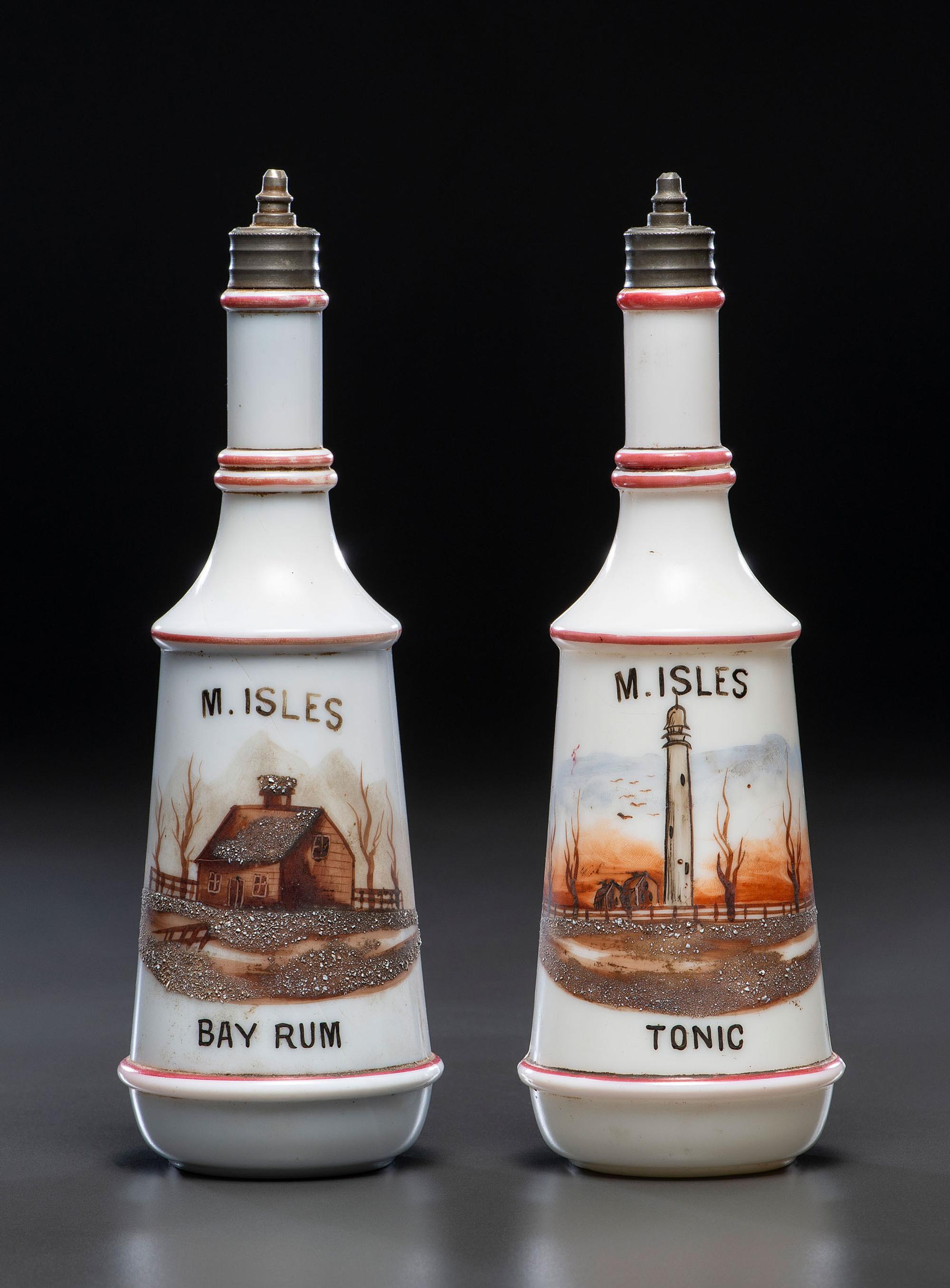 A Pair of Hand Painted Personalized Milk Glass Barber's Bottles