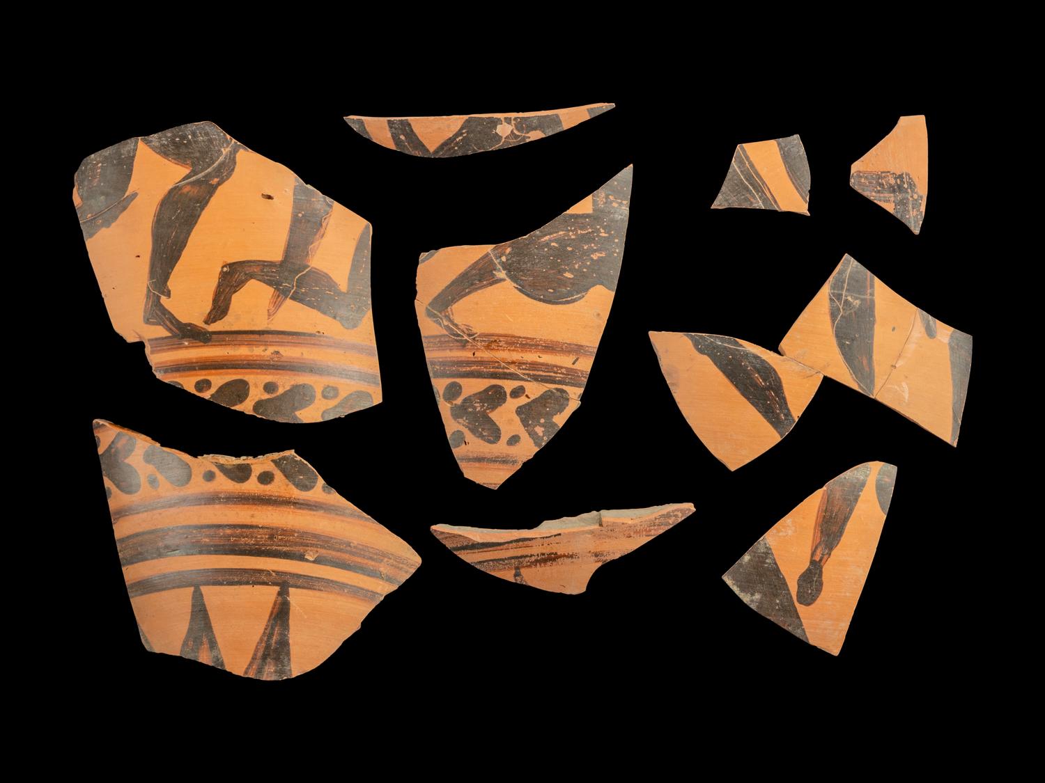 Nine Etruscan Black-Figured Amphora Fragments with a Fight Scene