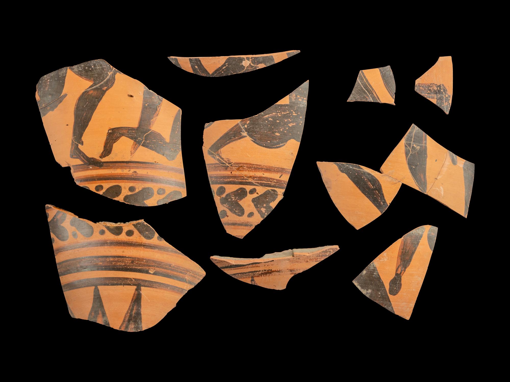 Nine Etruscan Black-Figured Amphora Fragments with a Fight Scene