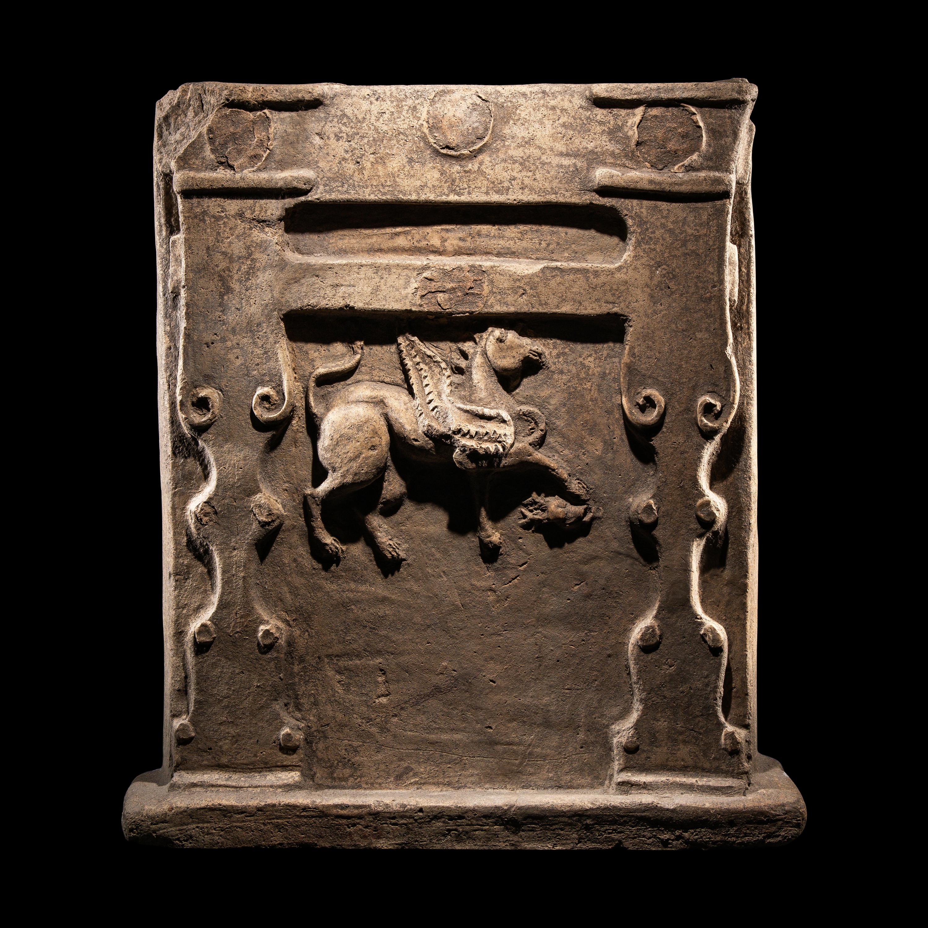 A Tarentine Terracotta Relief with a Griffin