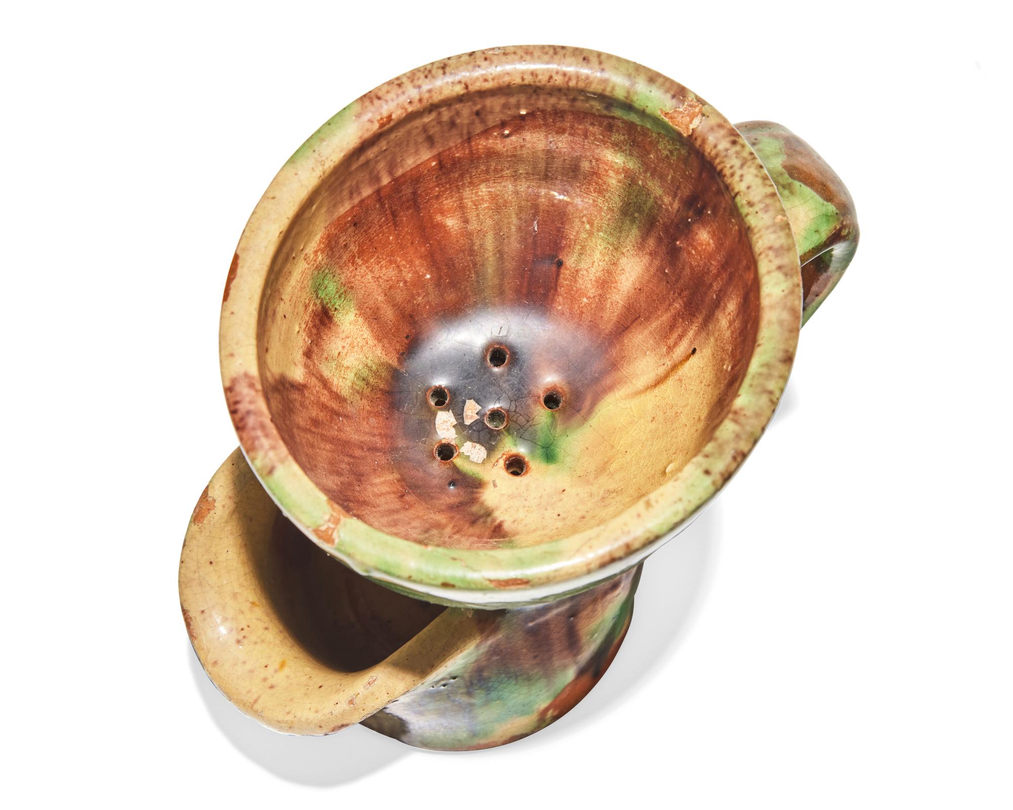 A Shenandoah Valley Multi-Glazed Redware Shaving Mug, Circa 1890