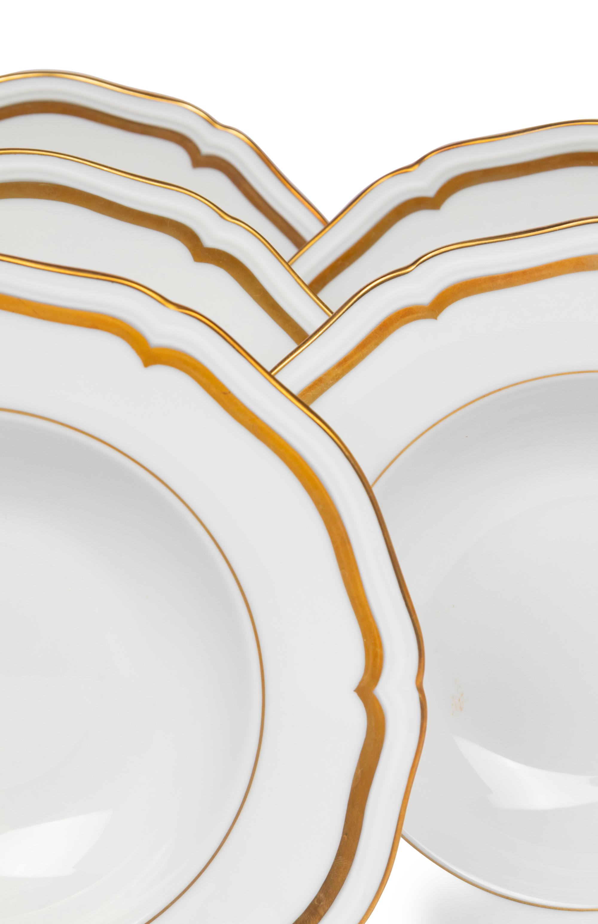 A Set of Twelve Raynaud Limoges Marie Antoinette Porcelain Soup Bowls