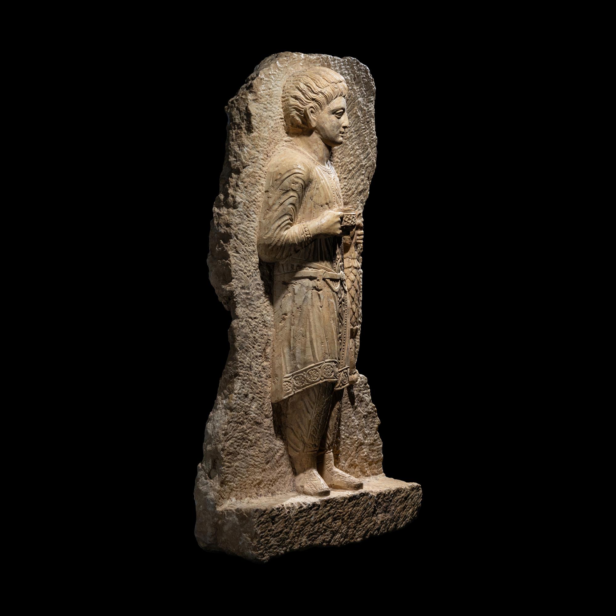 A Palmyrene Limestone Relief Fragment of a Youth