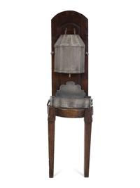 An Italian Carved Walnut Lavabo with Pewter Cistern and Basin