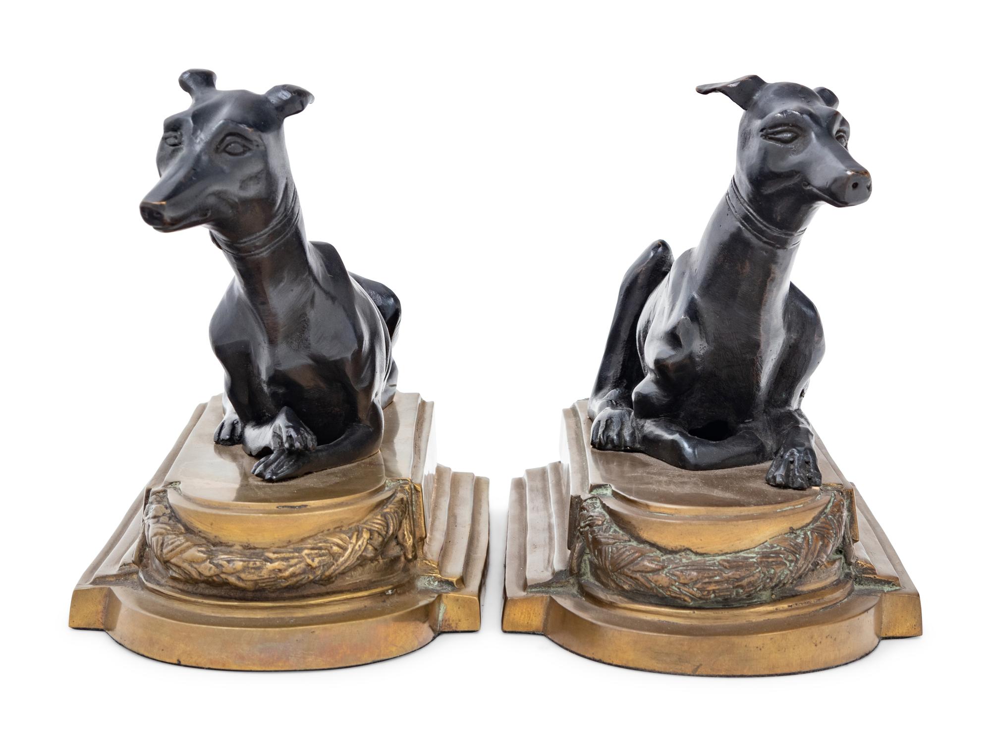 A Pair of Gilt and Patinated Bronze Figures of Whippets