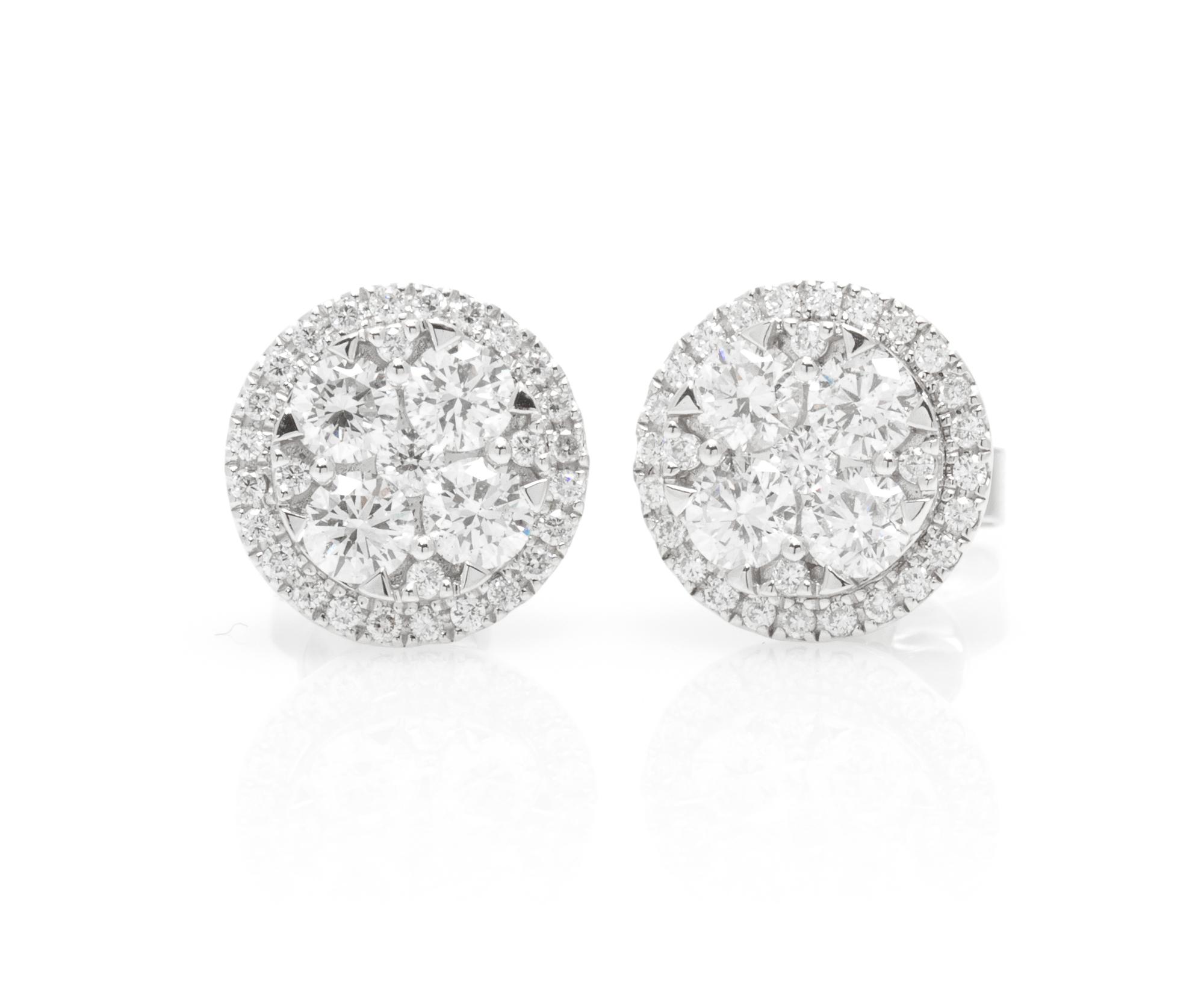 A Pair of 18 Karat White Gold and Diamond Earrings, 3.10 dwts.