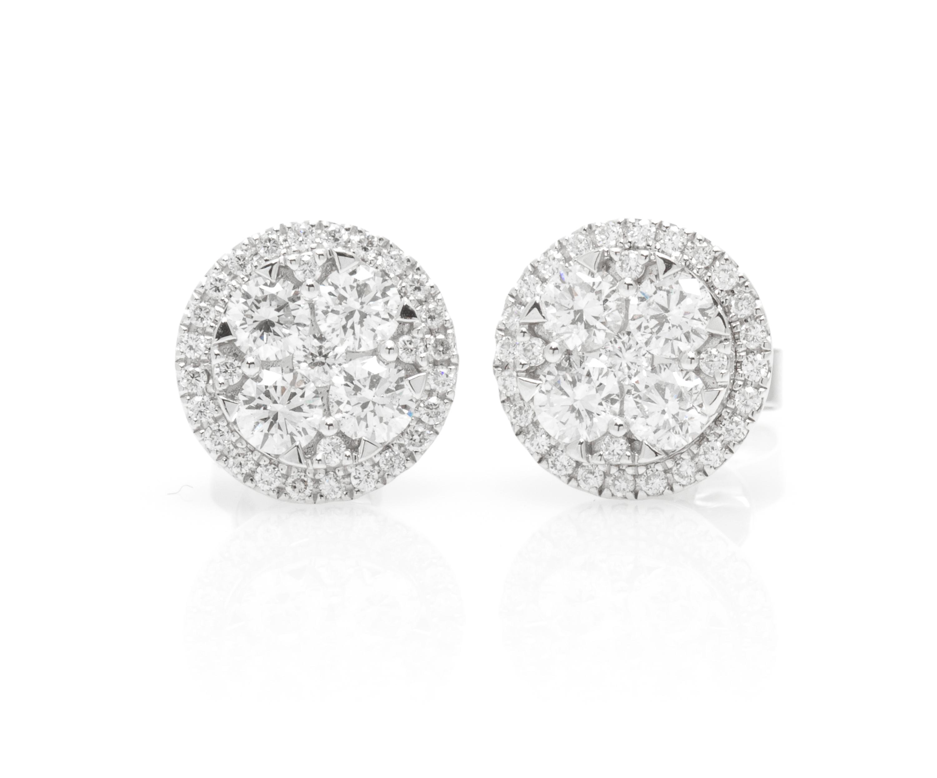 A Pair of 18 Karat White Gold and Diamond Earrings, 3.10 dwts.