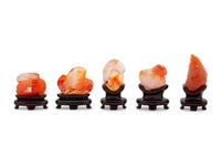 Seventeen Small Chinese Carnelian Agate Carvings