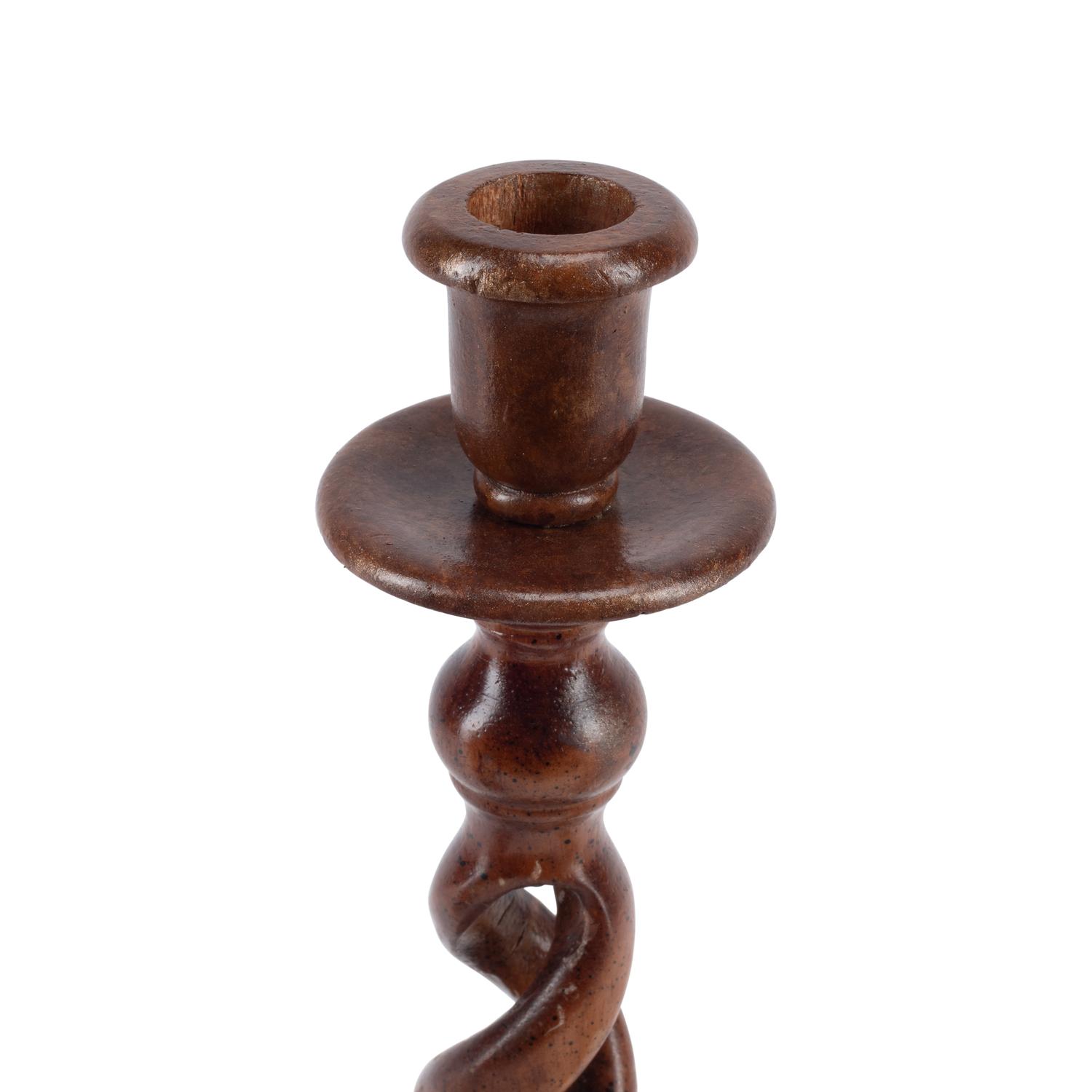 A Group of Seven Turned Wood Candlesticks