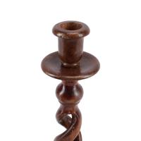 A Group of Seven Turned Wood Candlesticks